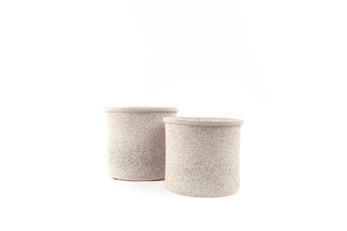 Conservatory Archives Plant Pots, Planter Pygar. Cylindrical planter with a textural pink finish.