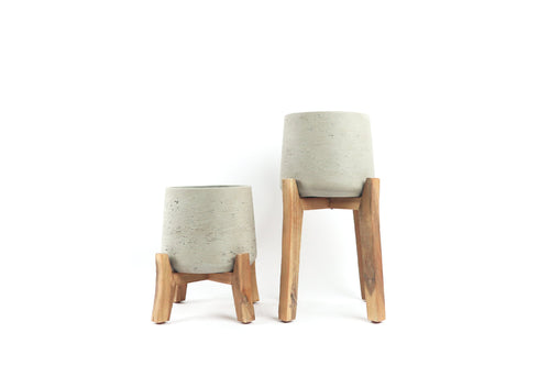 Conservatory Archives Plant Pot, Planter Dewey Light. Textured concrete planter with removable wooden legs.